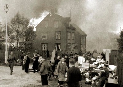 Houses burn in Narvik, Norway during the German Invasion in 1940