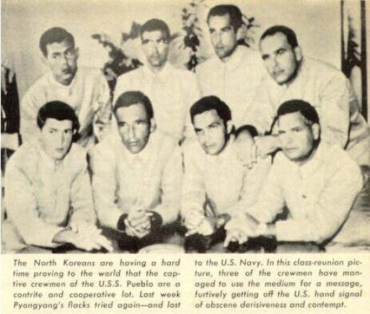 Crew of the USS Pueblo in a North Korean Propagana Photo Giving the Finger to the North Koreans