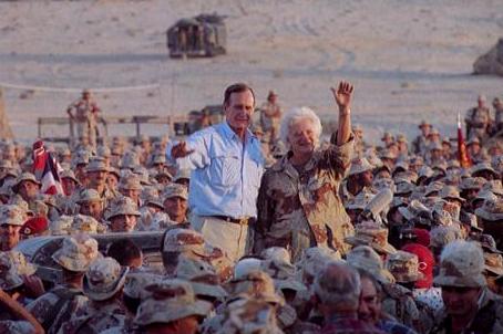 President George H.W. Bush and First Lady Barbara Bush visiting American troops in Saudi Arabia