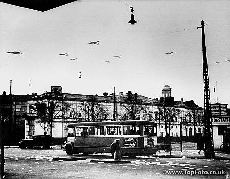 German planes drop propaganda over Copenhagen, Denmark, 1940.